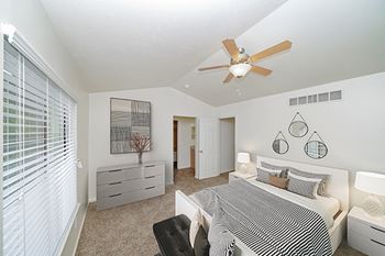 Master bedroom with vaulted ceiling